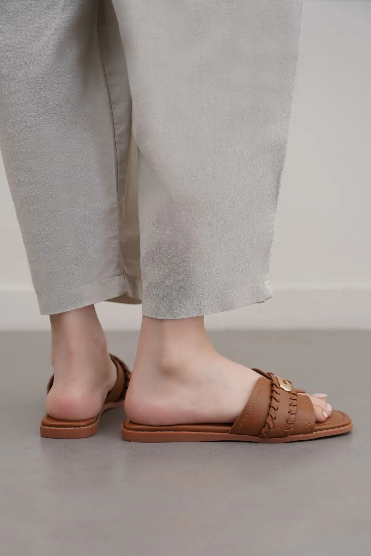 WHIPSTITCH SLIDES