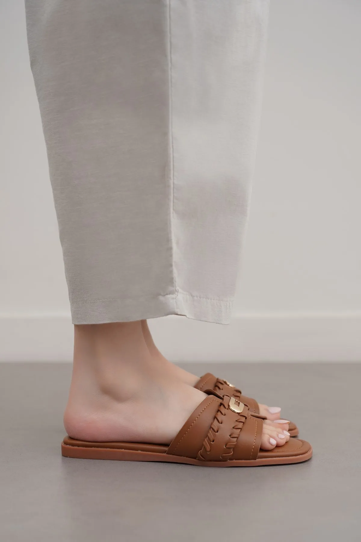 WHIPSTITCH SLIDES